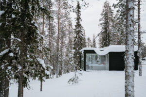 Akaslompolo Finland Winter Engagement glass cabins from Arctic Lodge with trees and snow