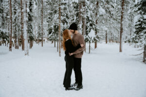 Akaslompolo Finland Winter Engagement with reindeer in background