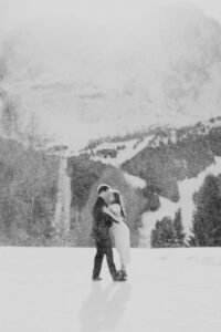Passo Gardena Dolomites Winter Engagement, black and white art photo with couple out of focus