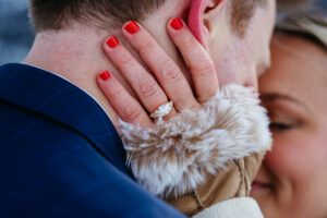 Passo Gardena Dolomites Winter Engagement, close up of ring and hands and gloves