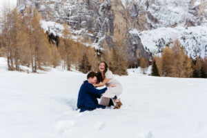 Passo Gardena Dolomites Winter Engagement, couple trips in the snow