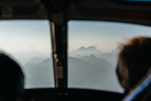 Mountain layers view from helicopter of Elikos during engagement photo session in the Dolomites
