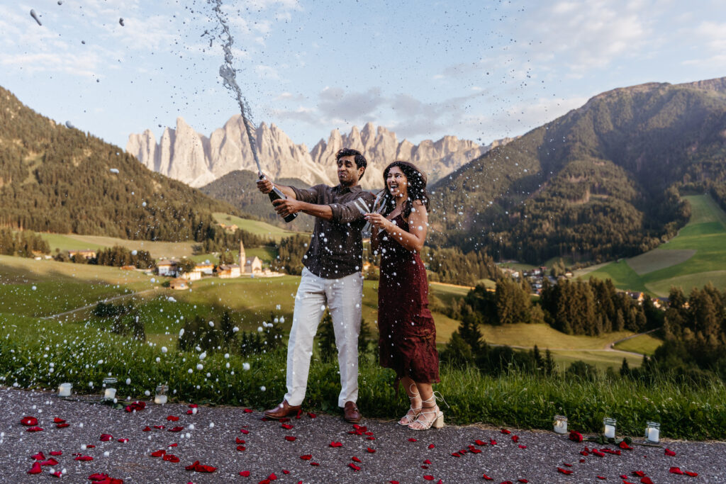 Popping champagne at Val di Funes