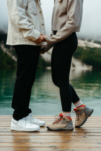 Detail of hiking boots during engagement at Lago di Braies