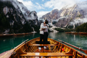 Couple embracing at Pragser Wildsee engagedment