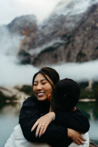 Woman hugging man after engagement at La Palifitta