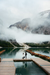 Proposal at Lago di Braies with moody sky