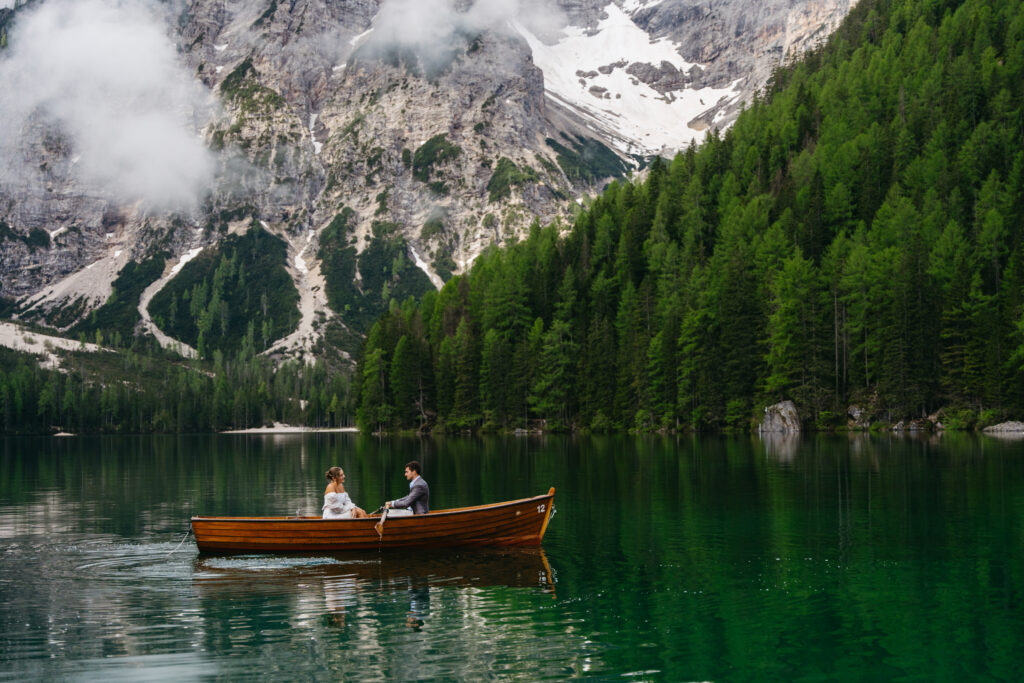 Couple rowing boat from La Palifitta at Pragser wildsee