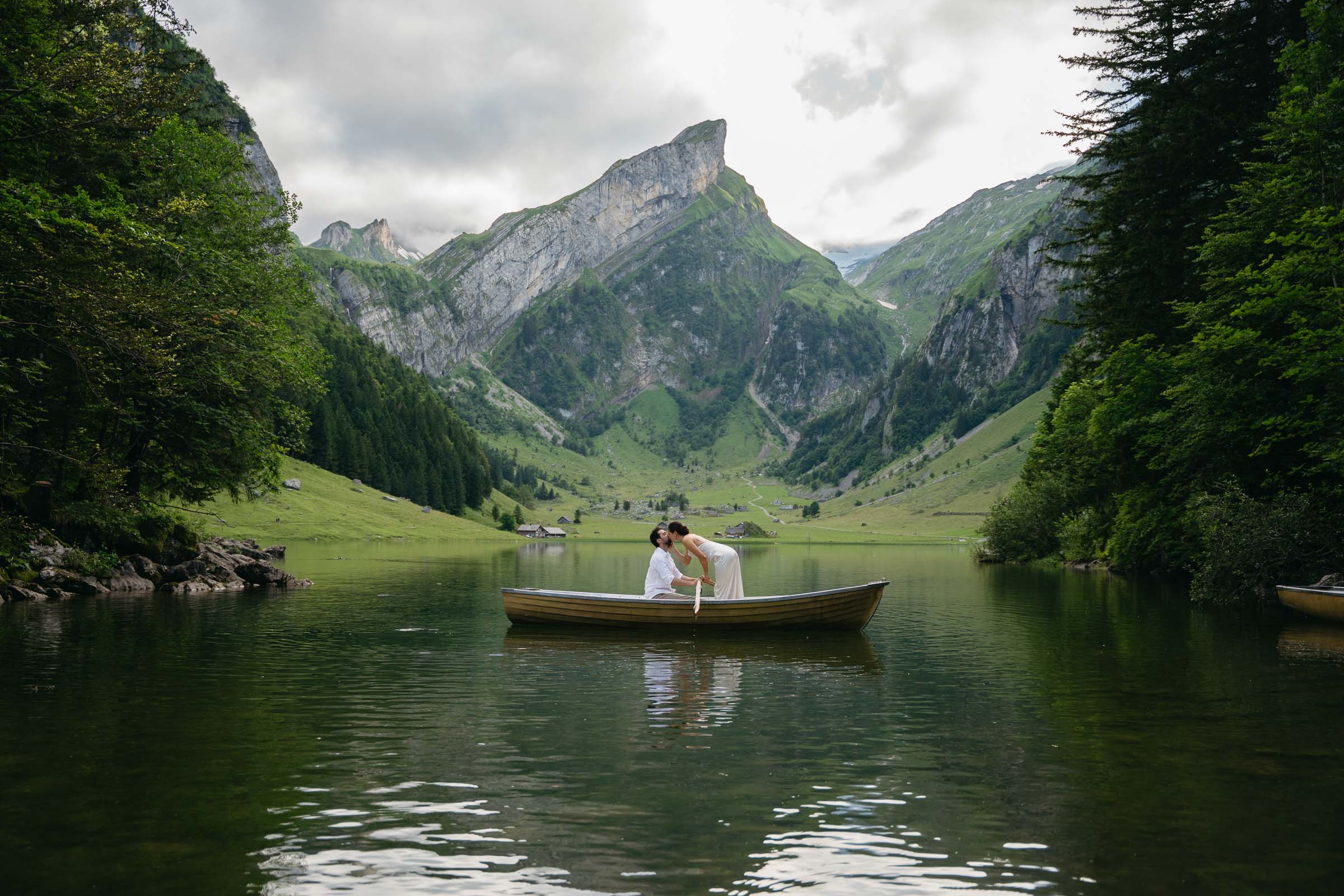 Bride and Groom eloping on Seealpsee by boat