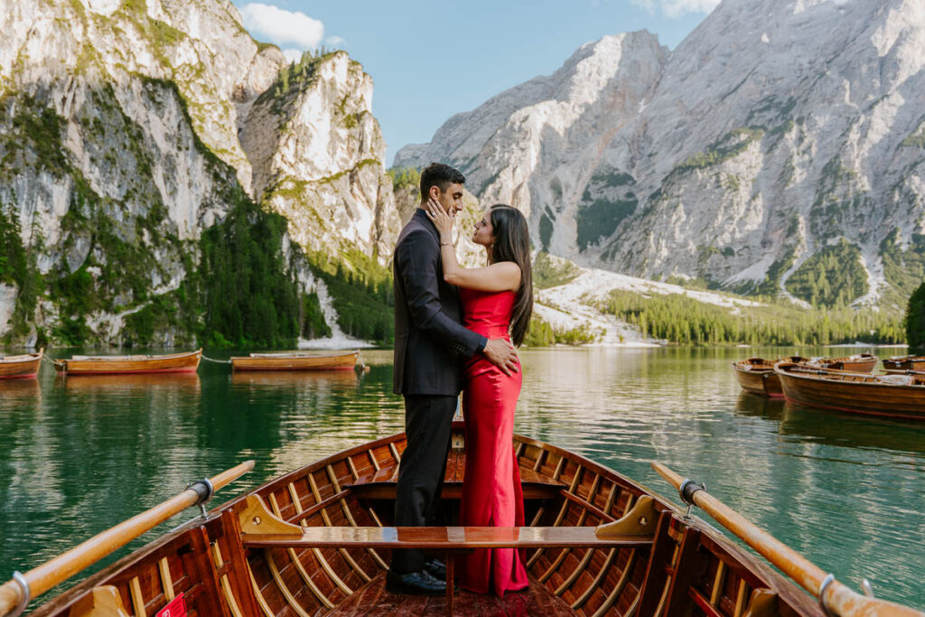 Engaged couple enjoying a boatride at sunset at La Palifitta on Lago di Braies