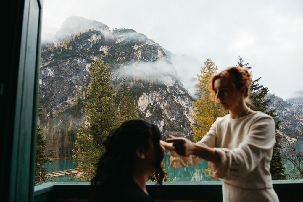 Bride getting ready at Lago di Braies, the ultimate guide to elope in autumn