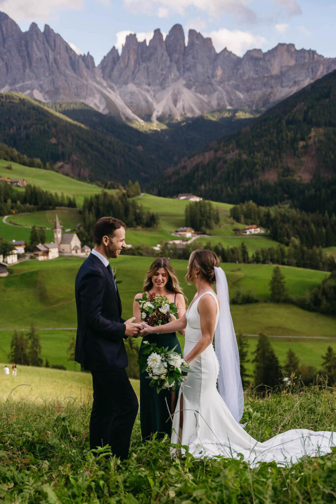 Elopement vendor celebrant marrying bride and groom at Val di Funes