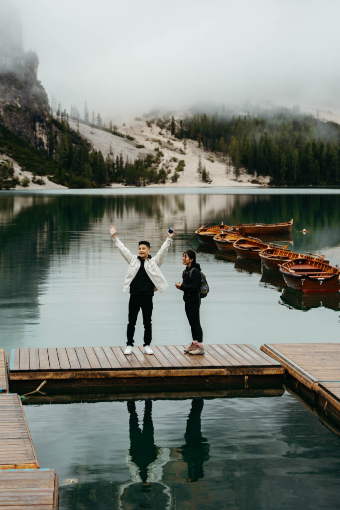 Man very happy that his wife-to-be said yes to his proposal on Lago di Braies