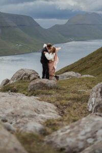 Bride and groom kissing at Klakkur during their Faroe Island elopement