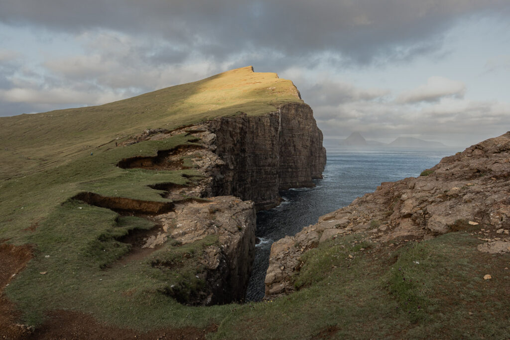 Traelanipa Faroe Islands as sun hits it warmly