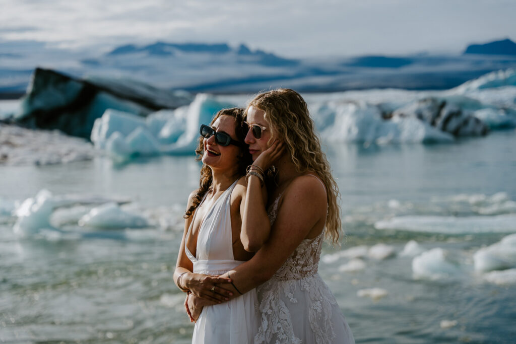 Bride and bride eloping at Jökulsárlón Glacier Lagoon. Best places to elope in Iceland