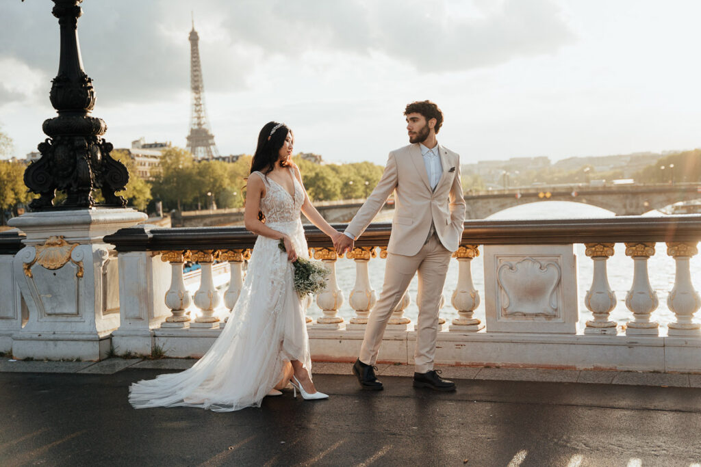 Bride and groom eloping on Pont Alexander III in Paris, one of the best elopement locations in Europe