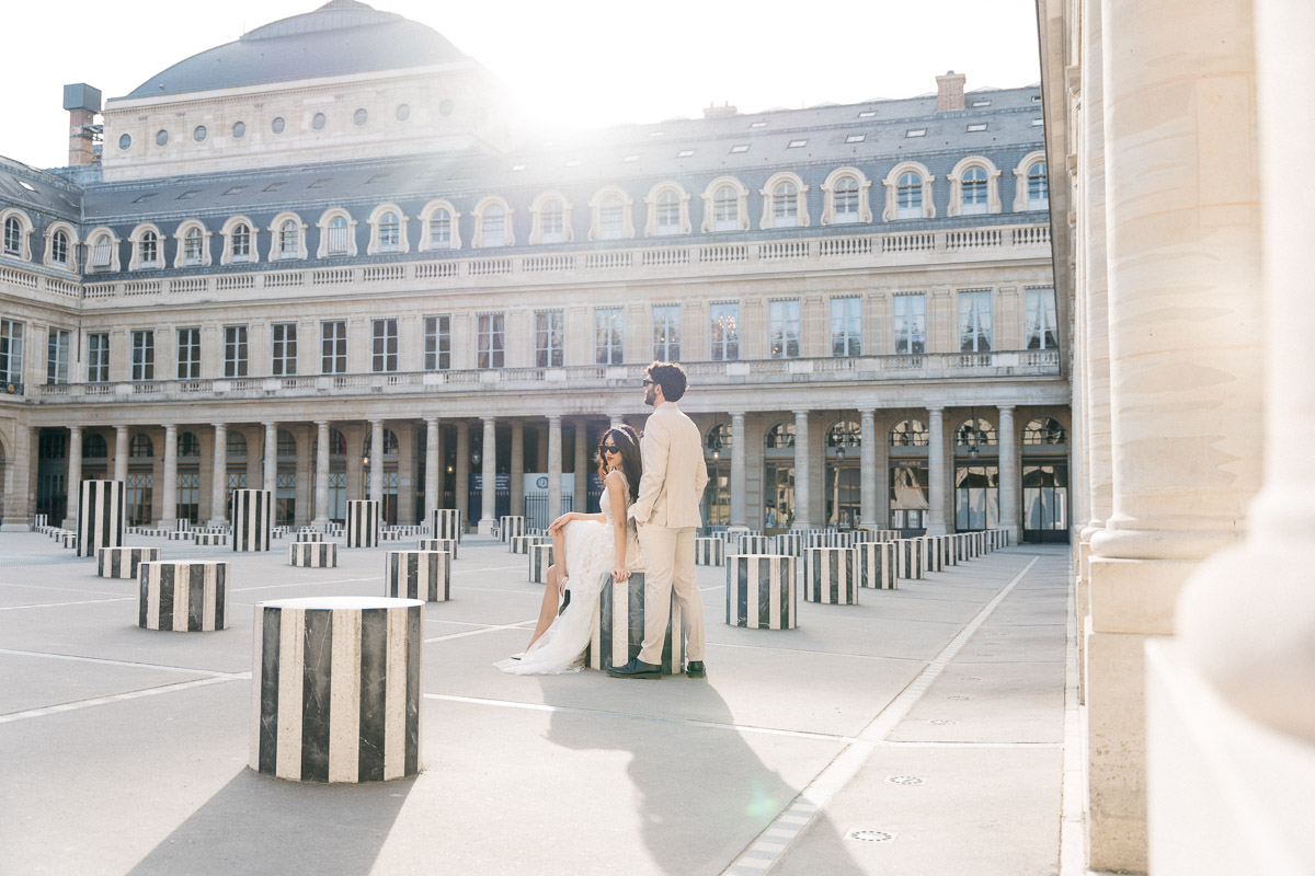 The Ultimate Elopement Guide to Paris; bride and groom eloping at Palais Royal